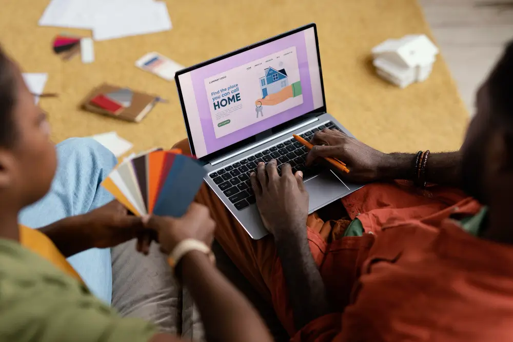 Close up hands designing on a laptop